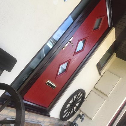 Red Composite Door with Rosewood Frame and Side LIghts for the Warrens of Abergavenny