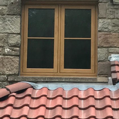Mr and Mrs Pulling Chepstow Timesless Flush Casement Heritage Windows in Irish Oak PVCu