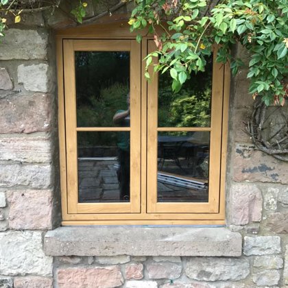 Mr and Mrs Pulling Chepstow Timesless Flush Casement Heritage Windows in Irish Oak PVCu