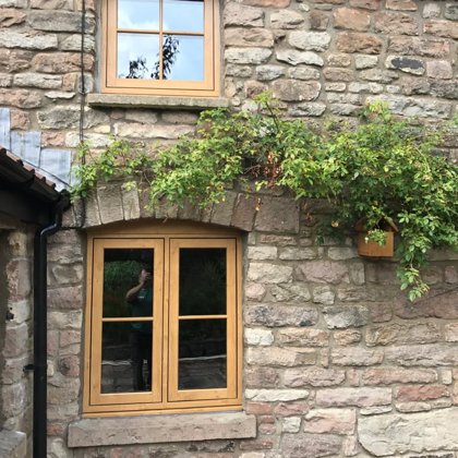 Mr and Mrs Pulling Chepstow Timesless Flush Casement Heritage Windows in Irish Oak PVCu