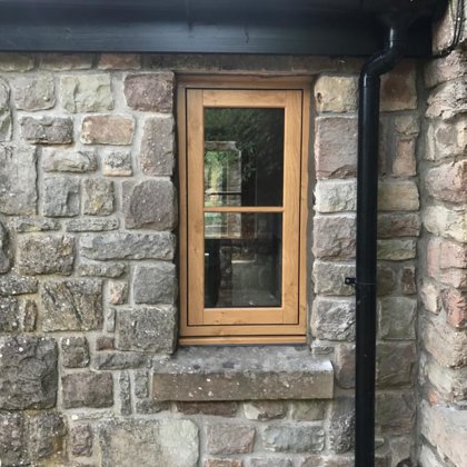 Mr and Mrs Pulling Chepstow Timesless Flush Casement Heritage Windows in Irish Oak PVCu
