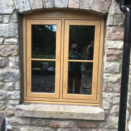 Mr and Mrs Pulling Chepstow Timesless Flush Casement Heritage Windows in Irish Oak PVCu