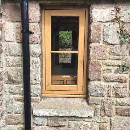 Mr and Mrs Pulling Chepstow Timesless Flush Casement Heritage Windows in Irish Oak PVCu