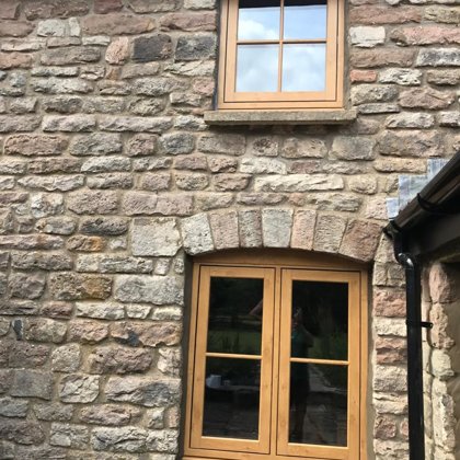 Mr and Mrs Pulling Chepstow Timesless Flush Casement Heritage Windows in Irish Oak PVCu