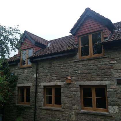 Mr and Mrs Pulling Chepstow Timesless Flush Casement Heritage Windows in Irish Oak PVCu