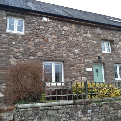 The Caswells Llanellen Timesless Flush Casement Heritage Windows in Woodgrain White PVCu