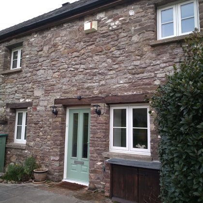 The Caswells Llanellen Timesless Flush Casement Heritage Windows in Woodgrain White PVCu