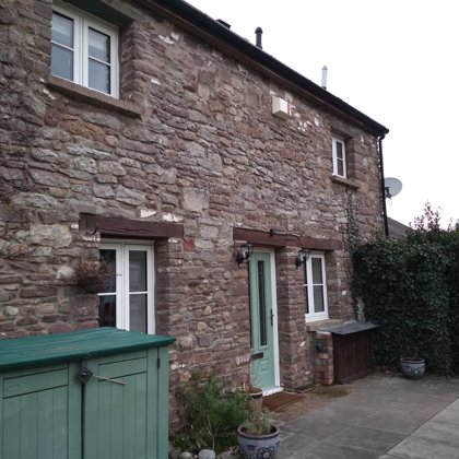 The Caswells Llanellen Timesless Flush Casement Heritage Windows in Woodgrain White PVCu