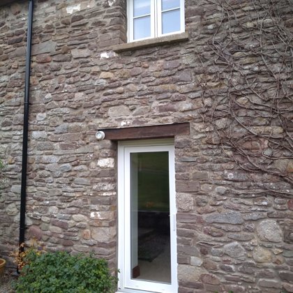 The Caswells Llanellen Timesless Flush Casement Heritage Windows in Woodgrain White PVCu