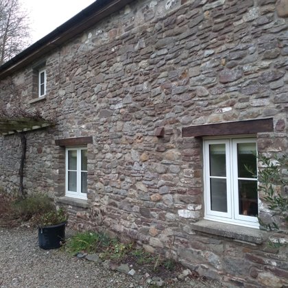The Caswells Llanellen Timesless Flush Casement Heritage Windows in Woodgrain White PVCu