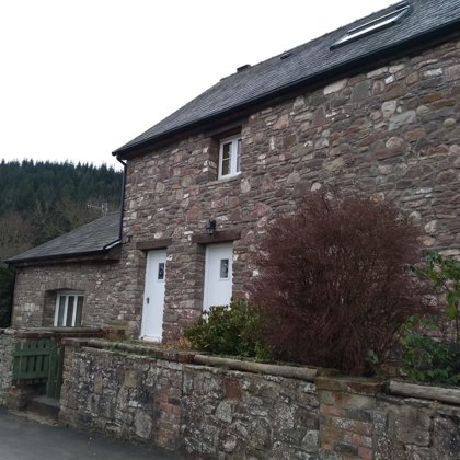 The Caswells Llanellen Timesless Flush Casement Heritage Windows in Woodgrain White PVCu