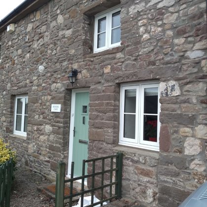 The Caswells Llanellen Solidor in Chartwell Green and Timesless Flush Casement Heritage Wi