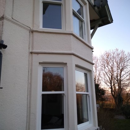 Textured White Sliding Sash Windows installed for the Balds of Brecon