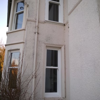 Textured White Sliding Sash Windows installed for the Balds of Brecon