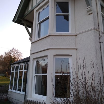 Textured White Sliding Sash Windows installed for the Balds of Brecon