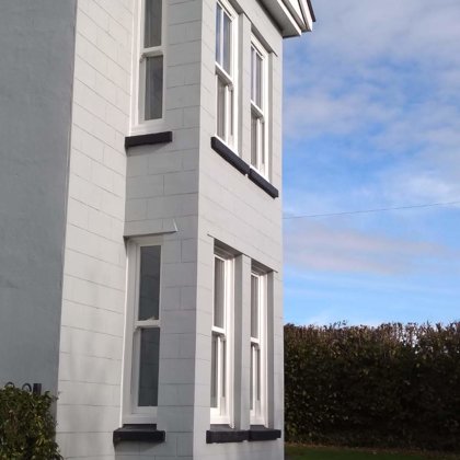 Textured White Sliding Sash Windows installed for the Lewis of Usk