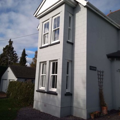 Textured White Sliding Sash Windows installed for the Lewis of Usk