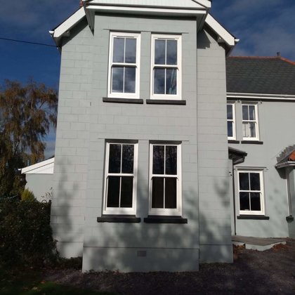 Textured White Sliding Sash Windows installed for the Lewis of Usk