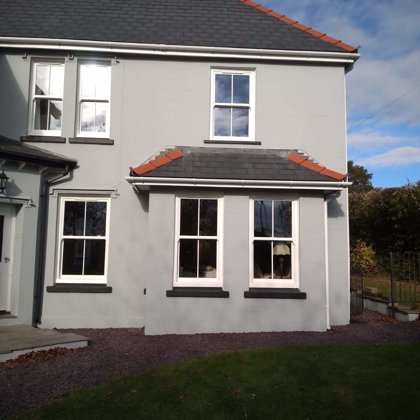 Textured White Sliding Sash Windows installed for the Lewis of Usk
