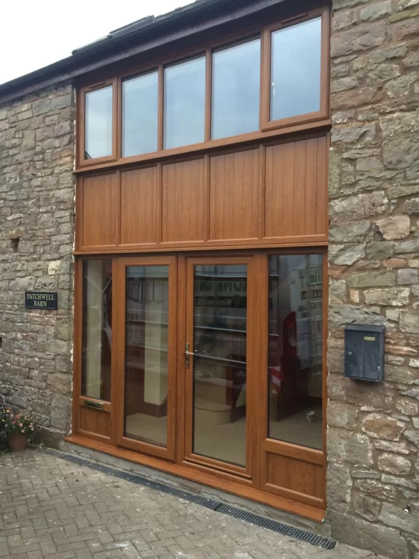 Double Height Barn Conversion Screen with Doors After in Duraflex PVCu Antique Golden Oak