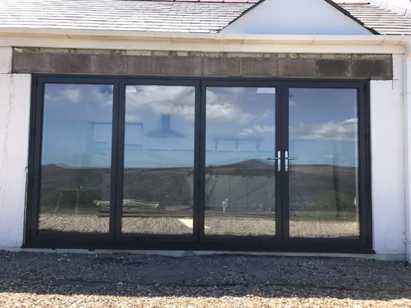 The Abbott-Swift, Gilwern 4 Section Wide-Span Bi-Folds overlooking the Sugarloaf Mountain