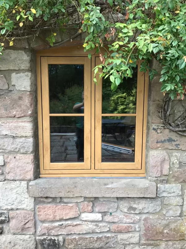 Mr and Mrs Pulling Chepstow Timesless Flush Casement Heritage Windows in Irish Oak PVCu