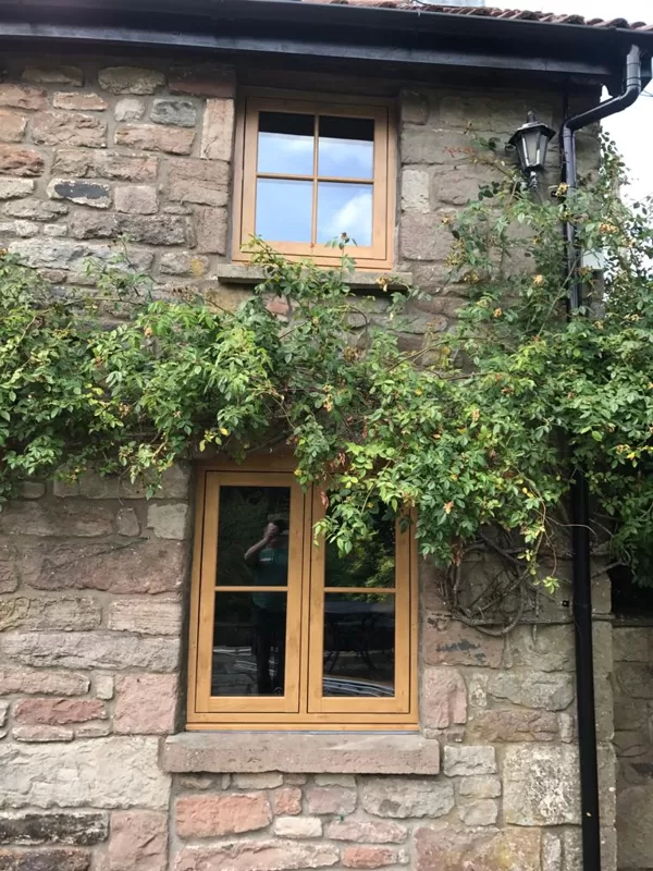 Mr and Mrs Pulling Chepstow Timesless Flush Casement Heritage Windows in Irish Oak PVCu