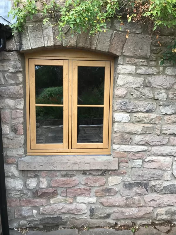 Mr and Mrs Pulling Chepstow Timesless Flush Casement Heritage Windows in Irish Oak PVCu