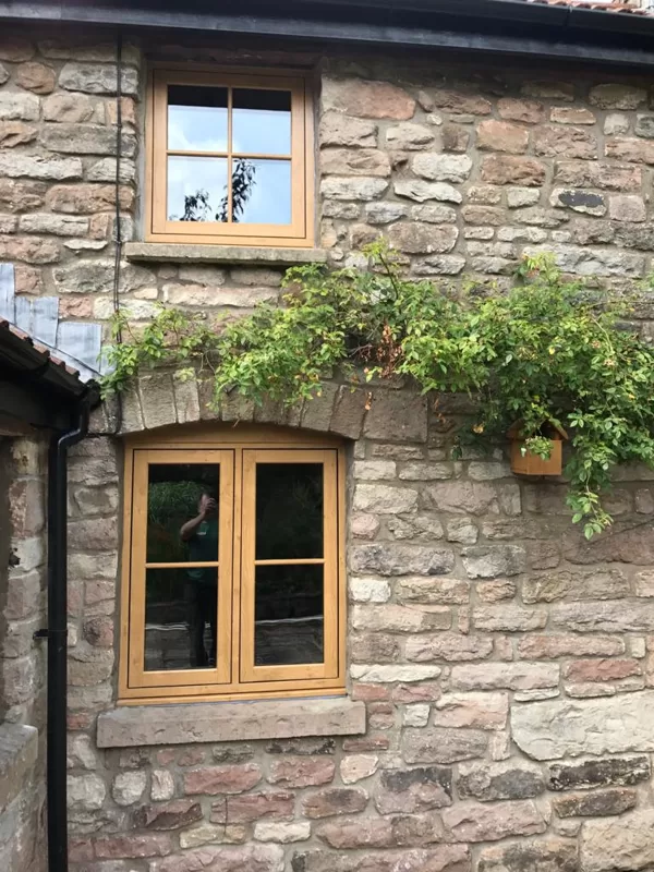 Mr and Mrs Pulling Chepstow Timesless Flush Casement Heritage Windows in Irish Oak PVCu