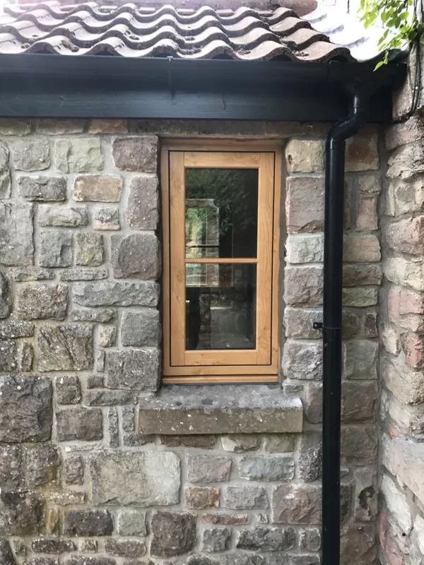 Mr and Mrs Pulling Chepstow Timesless Flush Casement Heritage Windows in Irish Oak PVCu