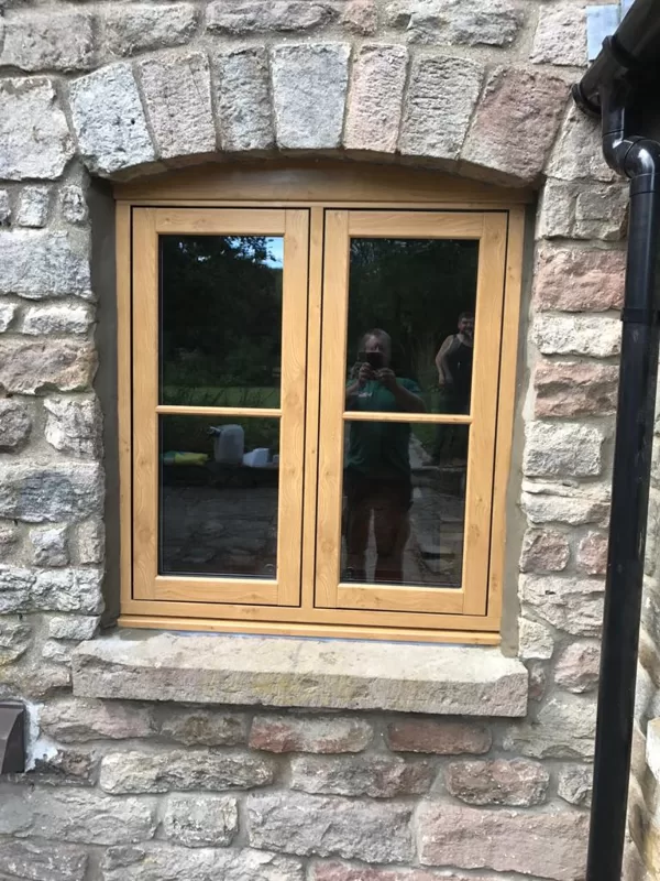Mr and Mrs Pulling Chepstow Timesless Flush Casement Heritage Windows in Irish Oak PVCu