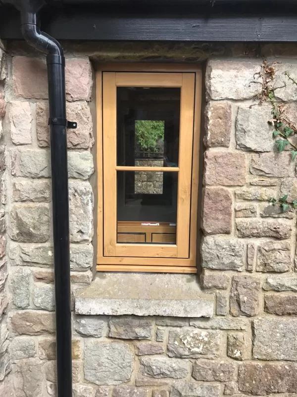 Mr and Mrs Pulling Chepstow Timesless Flush Casement Heritage Windows in Irish Oak PVCu