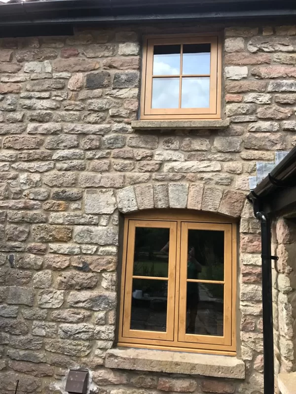 Mr and Mrs Pulling Chepstow Timesless Flush Casement Heritage Windows in Irish Oak PVCu