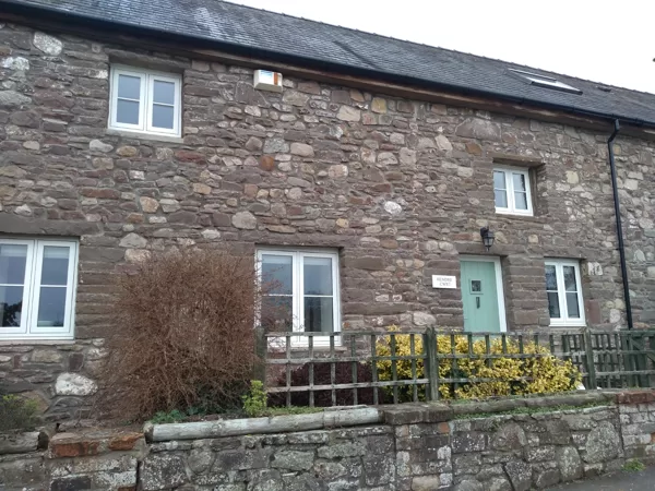 The Caswells Llanellen Timesless Flush Casement Heritage Windows in Woodgrain White PVCu