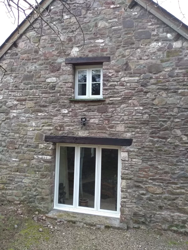 The Caswells Llanellen Timesless Flush Casement Heritage Windows in Woodgrain White PVCu