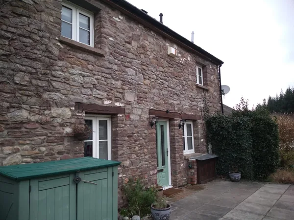 The Caswells Llanellen Timesless Flush Casement Heritage Windows in Woodgrain White PVCu