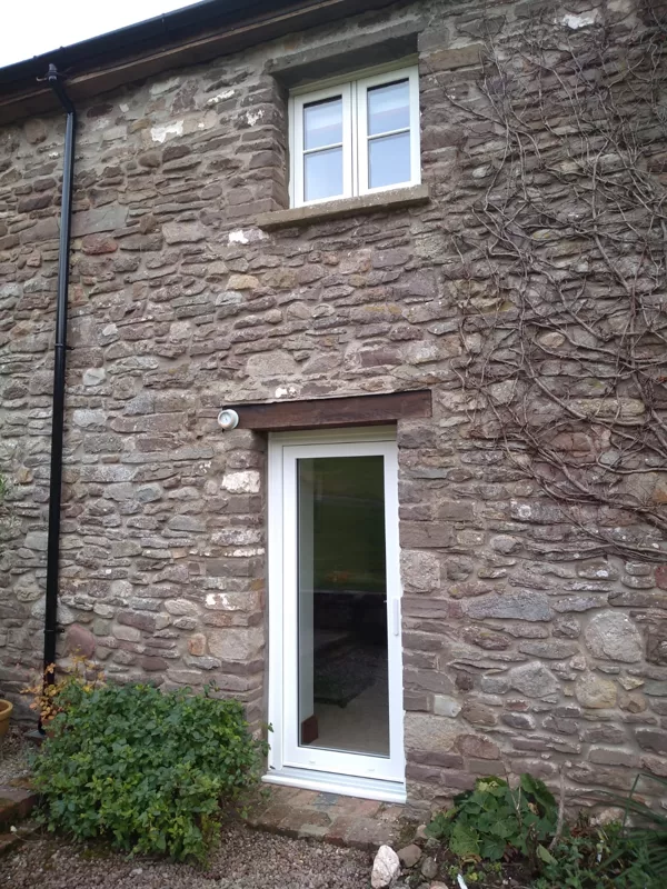 The Caswells Llanellen Timesless Flush Casement Heritage Windows in Woodgrain White PVCu