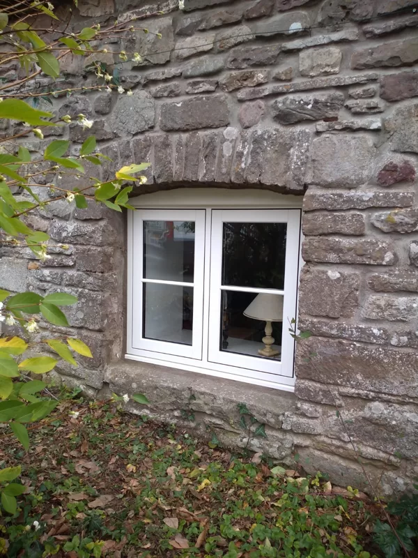 The Caswells Llanellen Timesless Flush Casement Heritage Windows in Woodgrain White PVCu