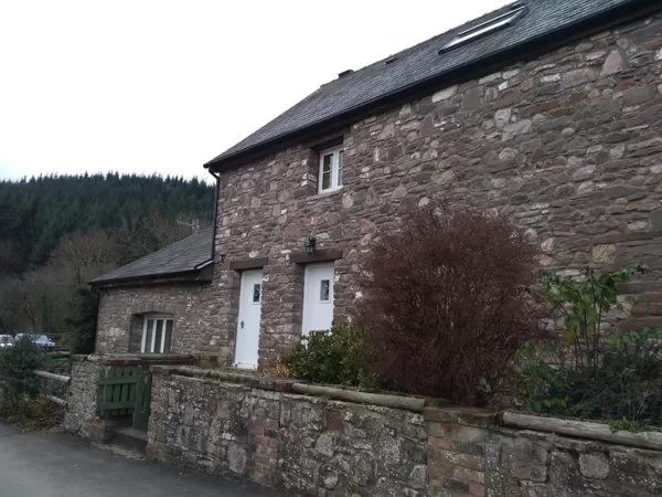 The Caswells Llanellen Timesless Flush Casement Heritage Windows in Woodgrain White PVCu