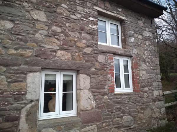 The Caswells Llanellen Timesless Flush Casement Heritage Windows in Woodgrain White PVCu