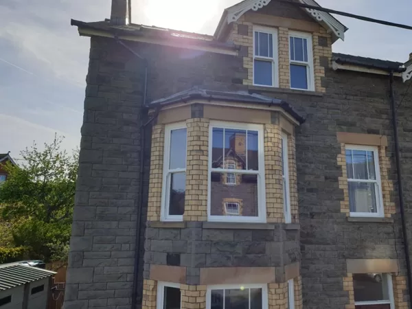 Textured White Legacy Vertical Sliding Sash Windows installed for the Proberts of Builth W
