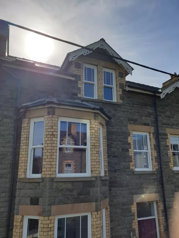 Textured White Legacy Vertical Sliding Sash Windows installed for the Proberts of Builth W