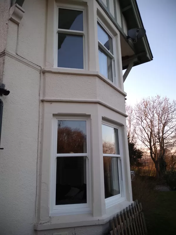 Textured White Sliding Sash Windows installed for the Balds of Brecon