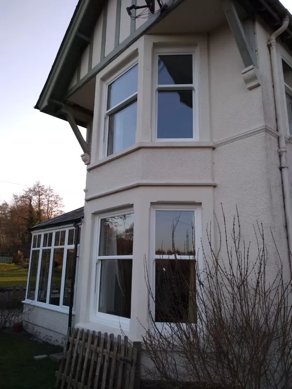 Textured White Sliding Sash Windows installed for the Balds of Brecon