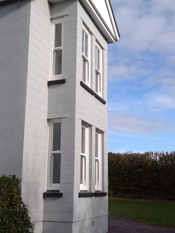 Textured White Sliding Sash Windows installed for the Lewis of Usk