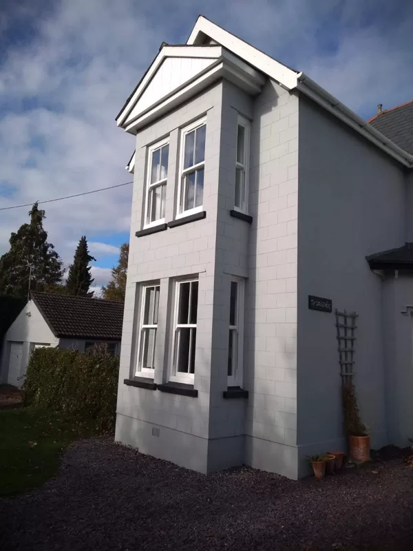 Textured White Sliding Sash Windows installed for the Lewis of Usk