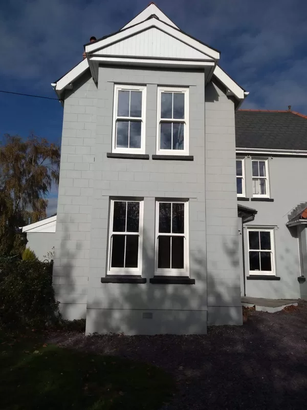 Textured White Sliding Sash Windows installed for the Lewis of Usk