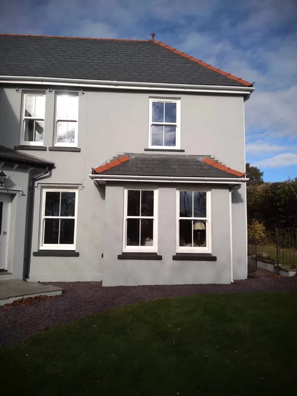 Textured White Sliding Sash Windows installed for the Lewis of Usk